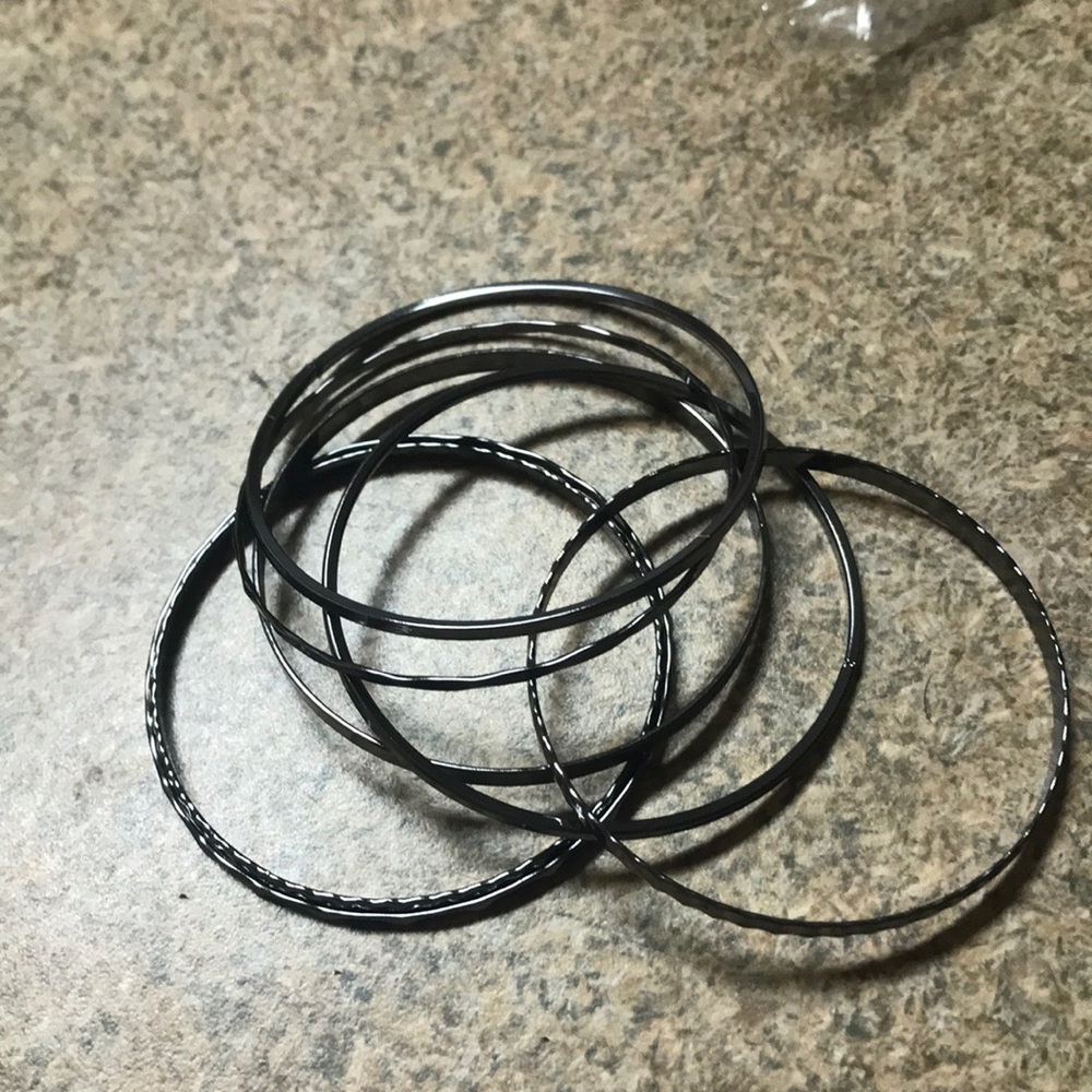 Gun metal bangle bracelets (7 piece).